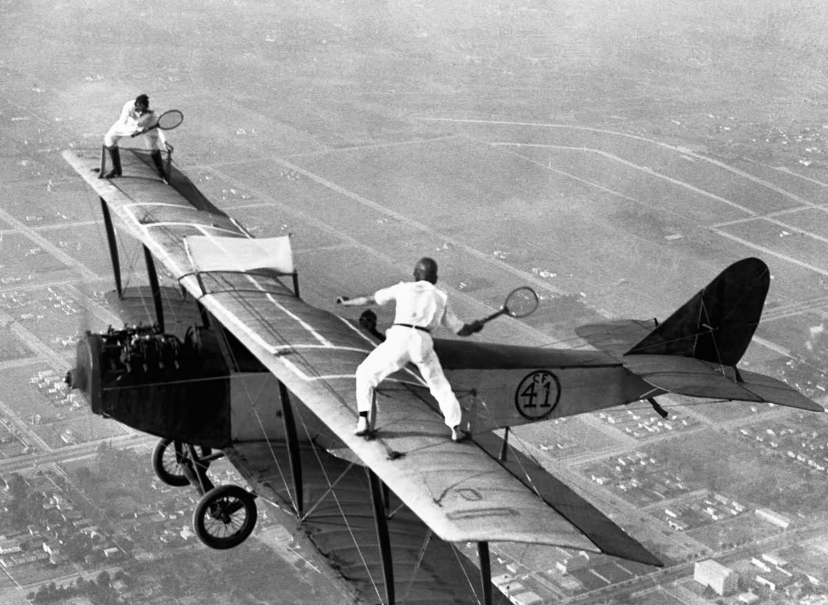 Tennis-Playing-On-Plane-Funny-Vintage.jpg